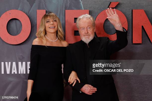 British and US movie director Ridley Scott and his wife Costa Rican actress Giannina Facio pose during a photocall for the movie Napoleon, in Madrid...