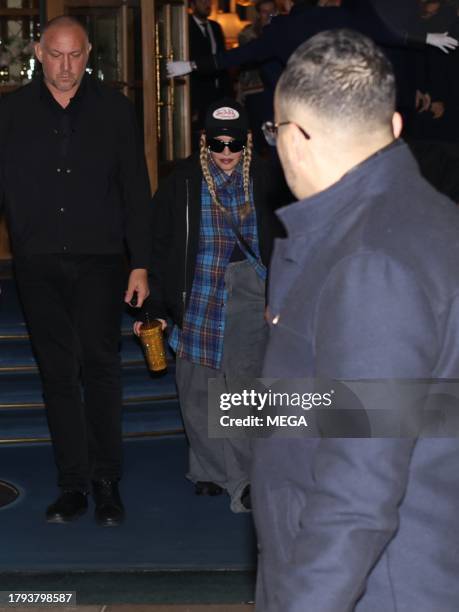 Madonna is seen leaving her hotel on November 20, 2023 in Paris, France.