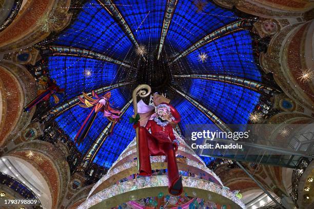 French famous fashion and luxury store Printemps and Galeries Lafayette decorated for Christmas on Haussmann Boulevard in Paris, France on November...