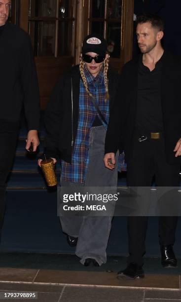 Madonna is seen leaving her hotel on November 20, 2023 in Paris, France.