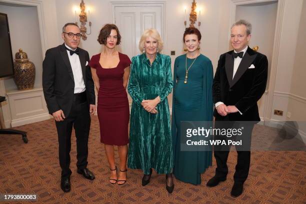 Queen Camilla poses with award nominees as she attends the annual awards ceremony which is celebrating its 135th anniversary at Sheraton Grand London...