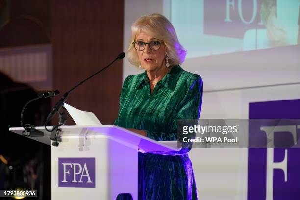 Queen Camilla gives a speech as she attends The Foreign Press Association Awards at Sheraton Grand London Park Lane on November 20, 2023 in London,...