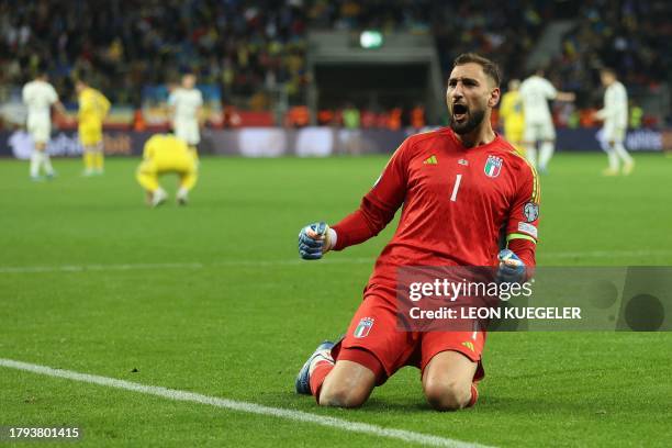 Italy's goalkeeper Gianluigi Donnarumma celebrates at the final whistle of the UEFA EURO 2024 Group C qualifying football match between Ukraine and...