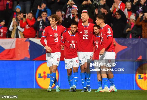 Czech Republic's midfielder Tomas Soucek celebrates scoring the 3-0 goal with his teammates during the UEFA Euro 2024 Group E Czech Republic v...