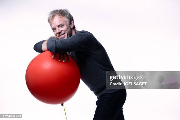 Canadian comic book author Delaf poses during a photo session in Paris, on November 20, 2023. Delaf is the author of the new album of Gaston Lagaffe,...