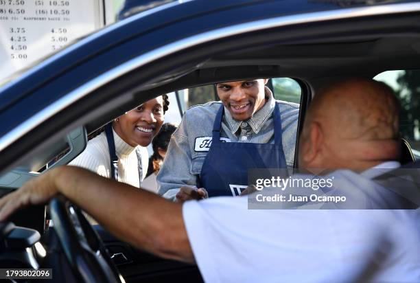 Russell Westbrook and his wife Nina, help pass out meals to families in need during the 12th annual Russell Westbrook Why Not? Foundation...