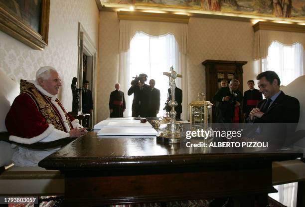 Pope Benedict XVI meets with French president Nicolas Sarkozy during a private audience at the Vatican, 20 December 2007. The visit comes amid a...