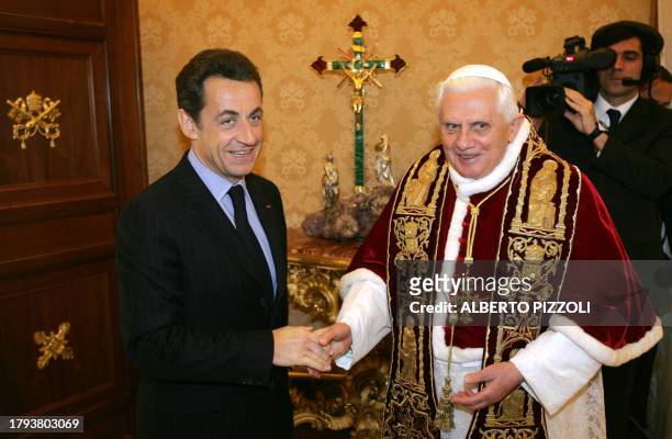 Pope Benedict XVI meets with French president Nicolas Sarkozy during a private audience at the Vatican, 20 December 2007. The visit comes amid a...