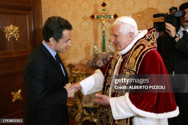 Pope Benedict XVI meets with French president Nicolas Sarkozy during a private audience at the Vatican, 20 December 2007. The visit comes amid a...