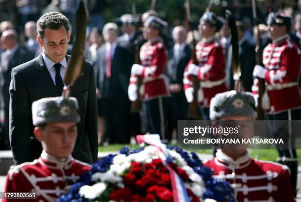 French President Nicolas Sarkozy prepares to lay a wreath at the Tomb of the Unknown Soldier during an arrival ceremony at Nevsky Square in Sofia,...