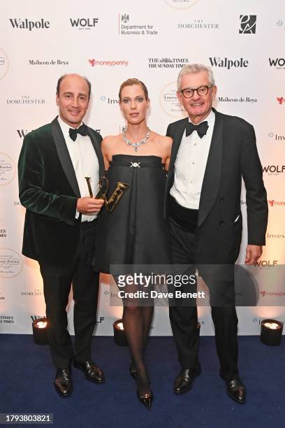 James Amos, Lady Amelia Spencer and Michael Wainwright, Managing Director of Boodles, accepting the British Luxury Brand of the Year award on behalf...