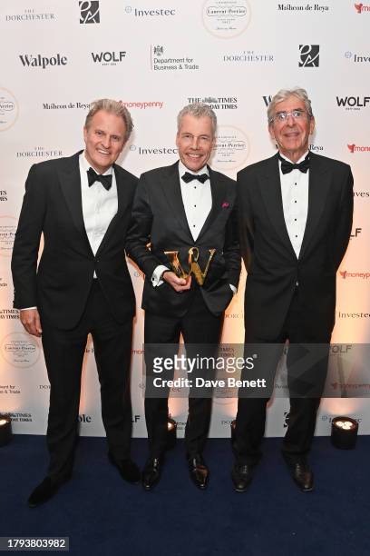 Simon Wolf, Torsten Muller-Otvos, CEO of Rolls-Royce Motor Cars Limited, winner of the Visionary award, and Michael Ward, Chairman of Walpole, attend...
