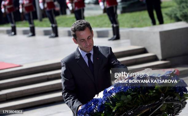 French President Nicolas Sarkozy lays a wreath at the Tomb of the Unknown Soldier during an arrival ceremony at Nevsky Square in Sofia, Bulgaria, 04...