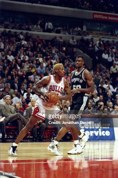 Dennis Rodman of the Chicago Bulls in action during the Bulls 87-83 win over the San Antonio Spurs at the United Center in Chicago, Illinois.