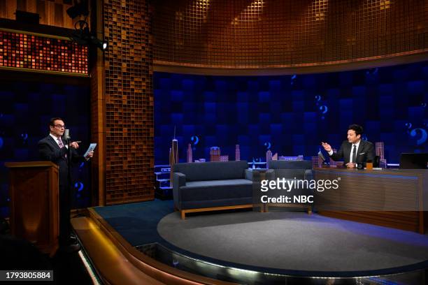 Episode 1879 -- Pictured: Announcer Steve Higgins and host Jimmy Fallon during "Tonight Show Trivia Night" on Monday, November 20, 2023 --