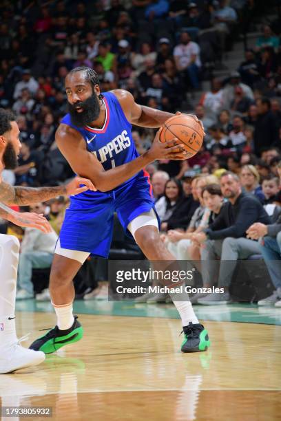 James Harden of the LA Clippers handles the ball during the game against the San Antonio Spurs on November 20, 2023 at the Frost Bank Center in San...