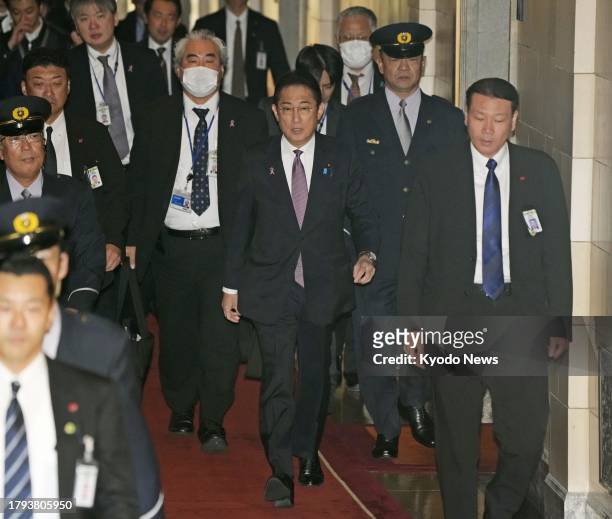 Japanese Prime Minister Fumio Kishida heads to a House of Representatives Budget Committee session in Tokyo on Nov. 21, 2023.