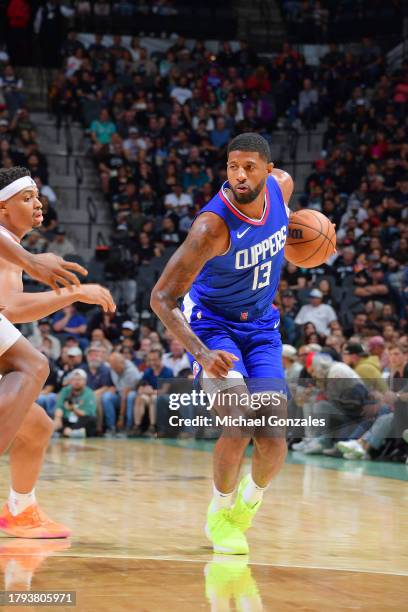 Paul George of the LA Clippers drives to the basket during the game against the San Antonio Spurs on November 20, 2023 at the Frost Bank Center in...