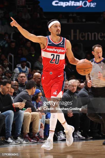 Landry Shamet of the Washington Wizards dribbles the ball during the game against the Milwaukee Bucks on November 20, 2023 at Capital One Arena in...