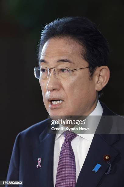 Japanese Prime Minister Fumio Kishida meets the press at his office in Tokyo on Nov. 21 after North Korea notified Japan of its plan to launch a...