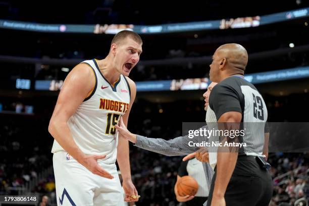 Nikola Jokic of the Denver Nuggets reacts against referee Tre Maddox and is ejected during the second quarter against the Detroit Pistonsat Little...