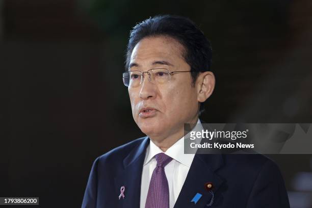 Japanese Prime Minister Fumio Kishida meets the press at his office in Tokyo on Nov. 21 after North Korea notified Japan of its plan to launch a...