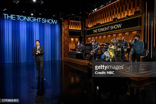Episode 1879 -- Pictured: Host Jimmy Fallon and The Roots during the monologue on Monday, November 20, 2023 --