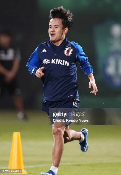 Japan's Takefusa Kubo trains in Jeddah, Saudi Arabia, on Nov. 19 two days ahead of a 2026 football World Cup second-round Asian qualifier against...
