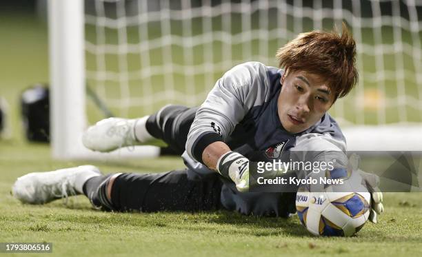 Japan goalkeeper Keisuke Osako trains in Jeddah, Saudi Arabia, on Nov. 19 two days ahead of a 2026 football World Cup second-round Asian qualifier...