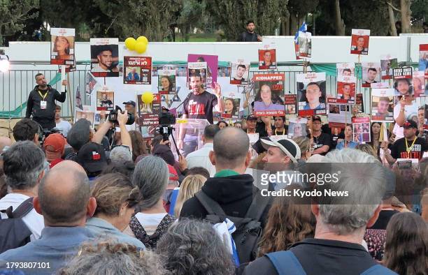 Israeli families of hostages held by the Palestinian militant group Hamas hold a rally in front of the Prime Minister's Office in Jerusalem on Nov....