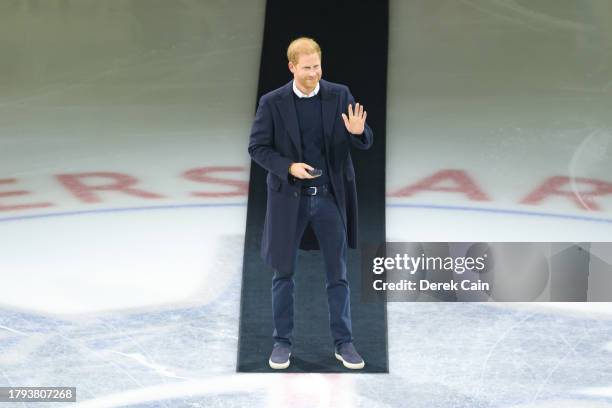 Prince Harry, The Duke of Sussex steps onto the ice for a ceremonial face-off prior to the Vancouver Canucks and San Jose Sharks NHL game at Rogers...