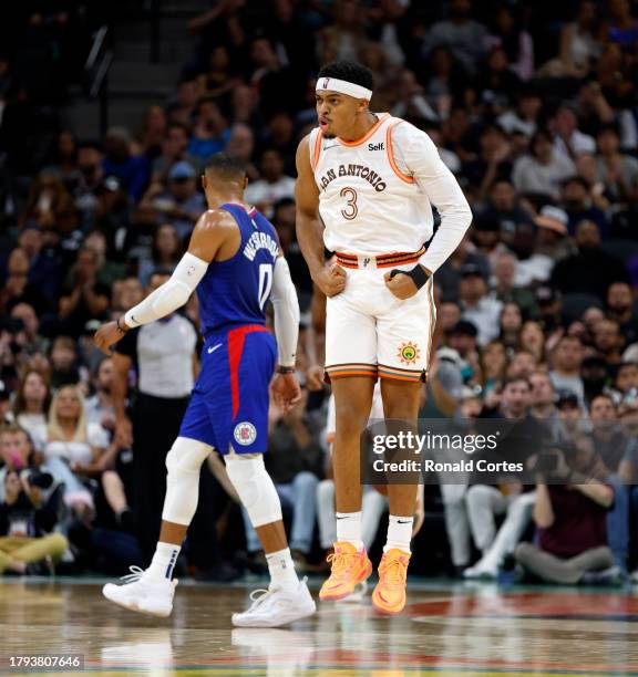 Keldon Johnson of the San Antonio Spurs reacts after a basket against the Los Angeles Clippers in the first half at Frost Bank Center on November 20,...