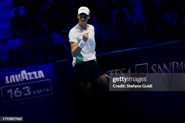 Jannik Sinner of Italy celebrates a point against Novak Djokovic of Serbia in their Men's Single's Nitto ATP match during day three of the Nitto ATP...