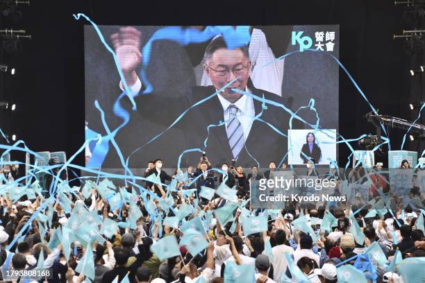 Presidential candidate Ko Wen-je of the Taiwan People's Party cheers with his supporters during a rally near Taipei on Nov. 19, 2023.
