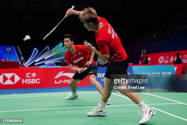 Ong Yew Sin and Teo Ee Yi of Malaysia compete in the Men's Doubles First Round match against Aaron Chia and Soh Wooi Yik of Malaysia during day one...