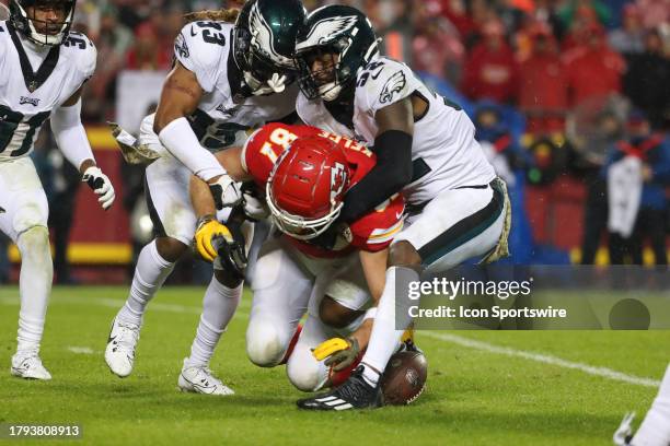 Philadelphia Eagles linebacker Zach Cunningham and cornerback Bradley Roby force a fumble by Kansas City Chiefs tight end Travis Kelce in the fourth...