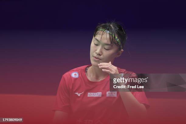 Hsu Wen-Chi of Chinese competes in the Women's Singles First Round match against Nozomi Okuhara of Japan Taipei during day one of the China Badminton...