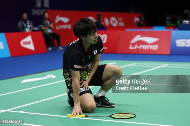 Kodai Naraoka of Japan competes in the Men's Singles First Round match against Chia Hao Lee of Chinese Taipei during day one of the China Badminton...