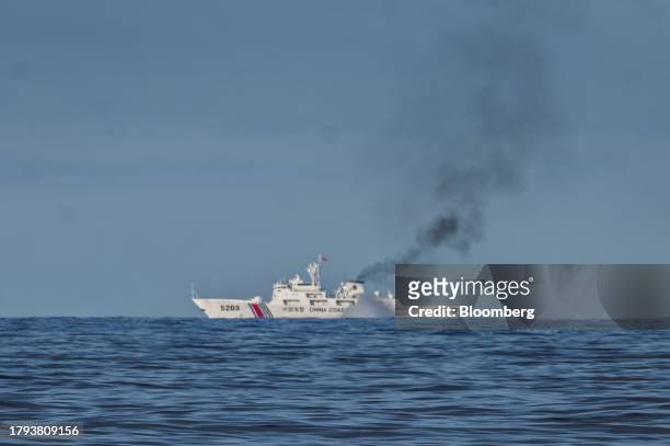 China Coast Guard ship during a resupply mission for the BRP Sierra Madre, in the Second Thomas Shoal, in the disputed South China Sea, on Friday,...