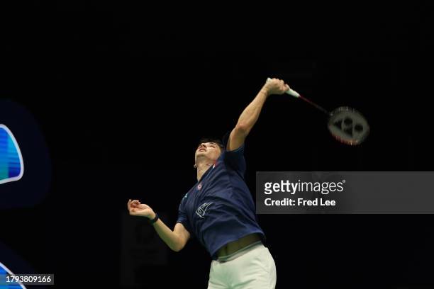 Christo Popov of France competes in the Men's Singles First Round match against Brian Yang of Canada during day one of the China Badminton Masters...