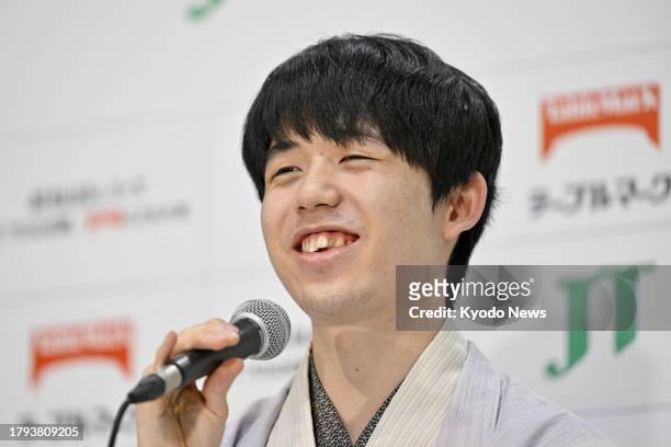 Shogi eight titles holder Sota Fujii speaks at a press conference in Tokyo on Nov. 19 after winning the Japan Tobacco Cup -- an annual tournament...