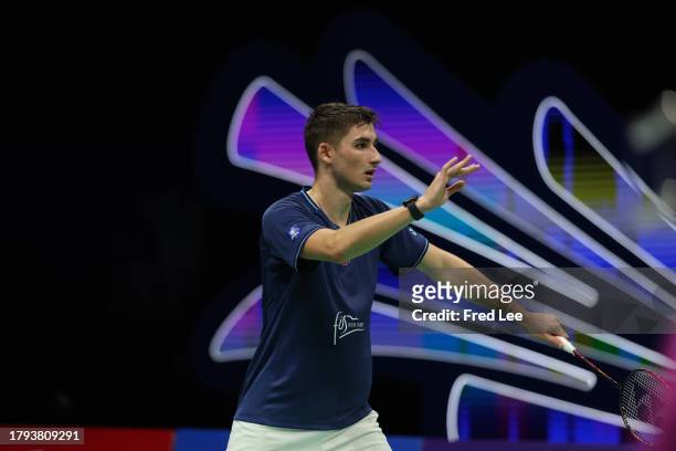 Christo Popov of France competes in the Men's Singles First Round match against Brian Yang of Canada during day one of the China Badminton Masters...