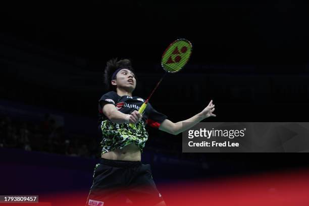Kodai Naraoka of Japan competes in the Men's Singles First Round match against Chia Hao Lee of Chinese Taipei during day one of the China Badminton...