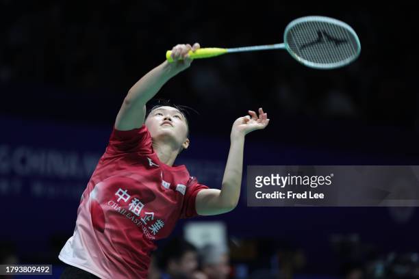 Hsu Wen-Chi of Chinese competes in the Women's Singles First Round match against Nozomi Okuhara of Japan Taipei during day one of the China Badminton...