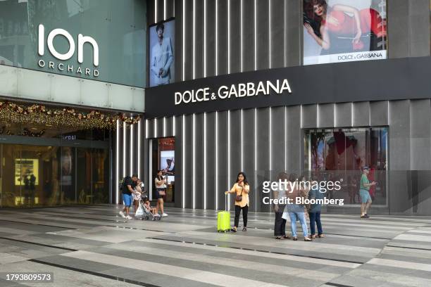 Shoppers in front of the ION mall in Singapore, on Monday, Nov. 20, 2023. Singapore's gross domestic product figures for the third quarter are...