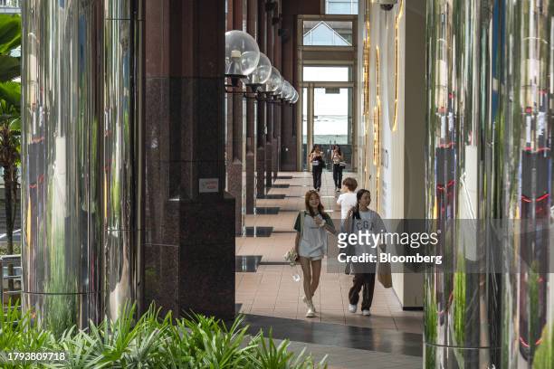 Shoppers on Orchard Road in Singapore, on Monday, Nov. 20, 2023. Singapore's gross domestic product figures for the third quarter are scheduled to be...