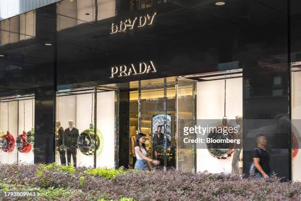 Pedestrians pass a Prada SpA store on Orchard Road in Singapore, on Monday, Nov. 20, 2023. Singapore's gross domestic product figures for the third...