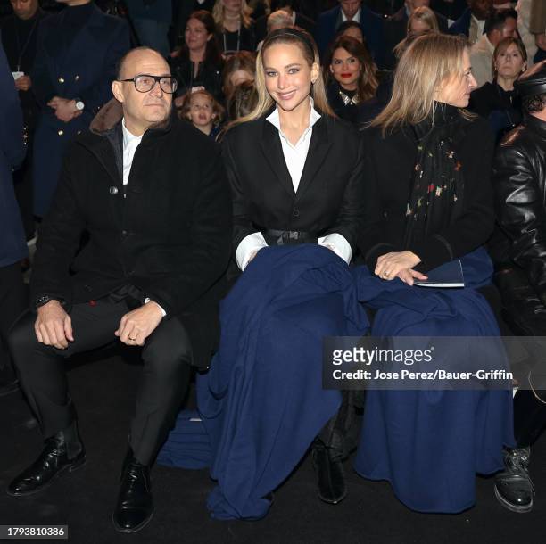 Marc Metrick, Jennifer Lawrence and Delphine Arnault are seen attending the Saks - Christian Dior holiday window display unveiling at Saks Fifth...