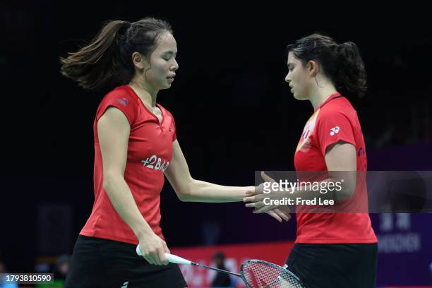 Margot Lambert and Anne Tran of France react in the Women's Doubles First Round match against Francesca Corbett and Allison Lee of the United States...