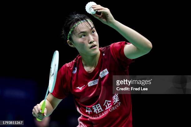 Hsu Wen-Chi of Chinese Taipei competes in the Women's Singles First Round match against Nozomi Okuhara of Japan during day one of the China Badminton...